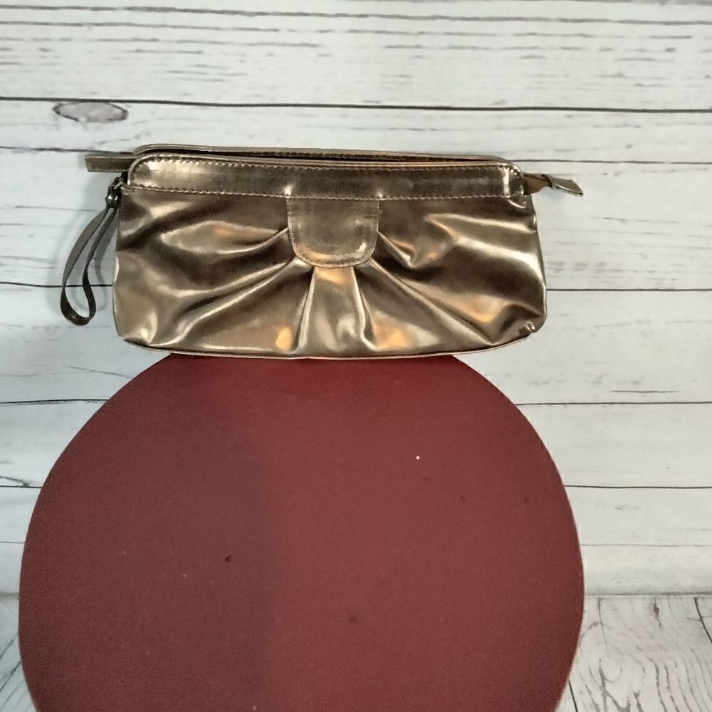 "Avon" woman's small hand purse